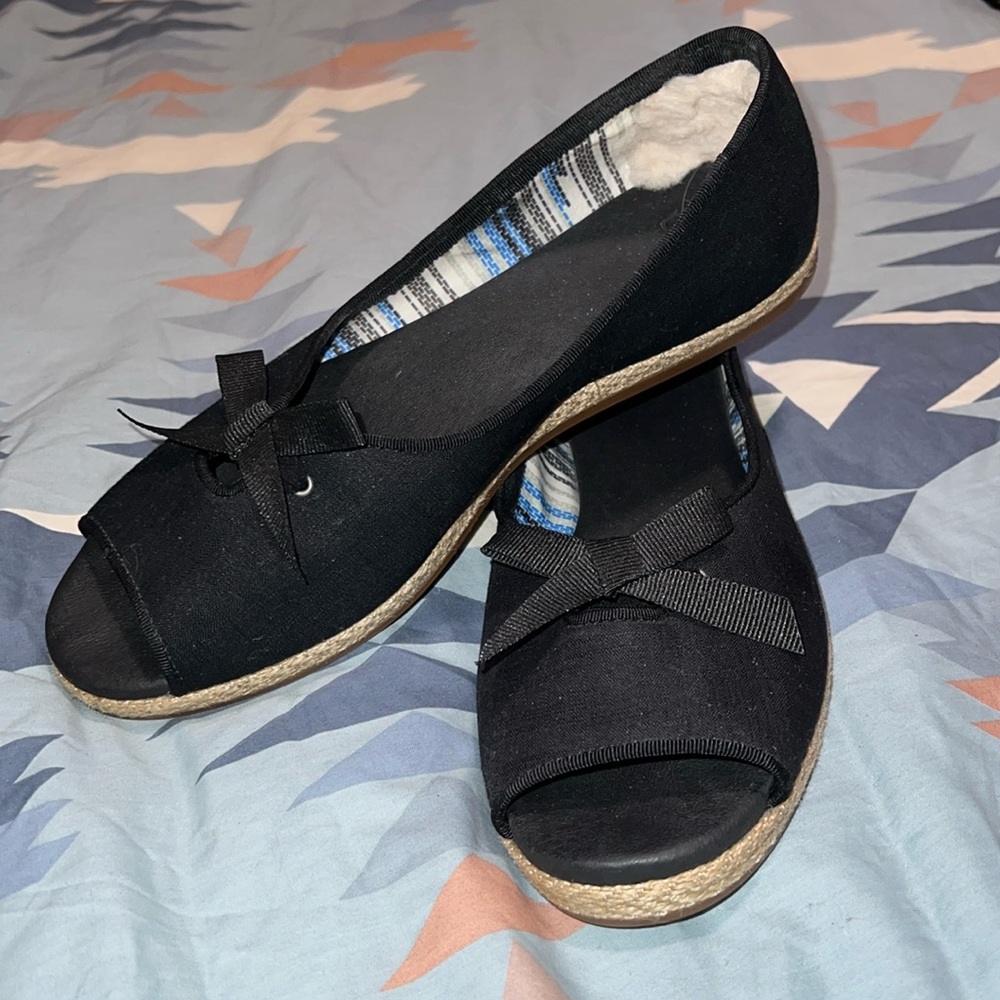 Black canvas flats, super comfortable.